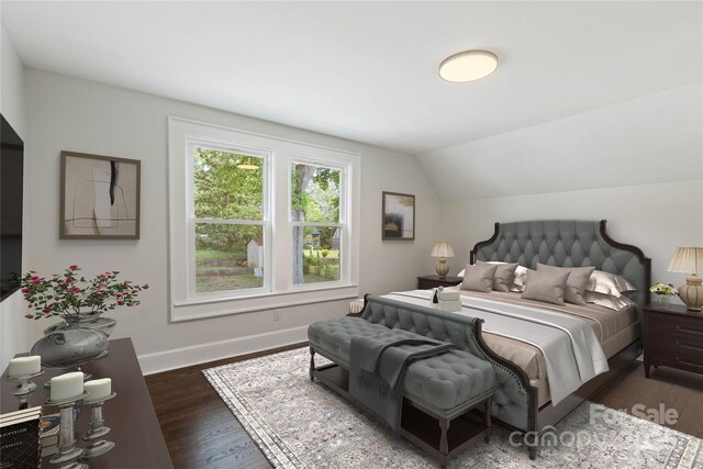415 Norwood St SW, Lenoir, NC 28645 - bedroom featuring dark wood-type flooring, lofted ceiling, and baseboards