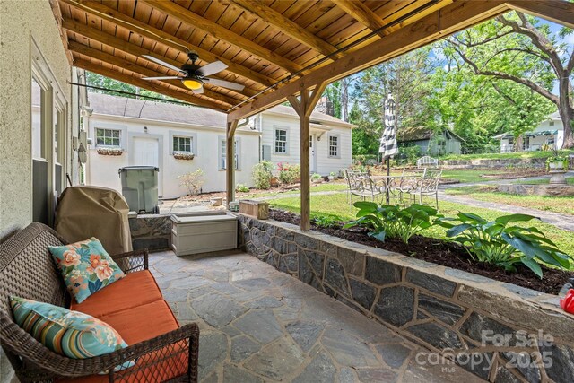 415 Norwood St SW, Lenoir, NC 28645 - view of patio featuring a ceiling fan