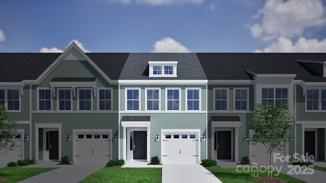 2716 Lehigh Rd, Charlotte, NC 28208 - view of property featuring a garage, driveway, and board and batten siding