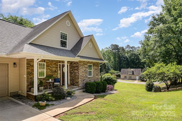 2845 Lakefront Dr, Belmont, NC 28012 - view of front of house featuring a porch, a shingled roof, a front yard, and stone siding
