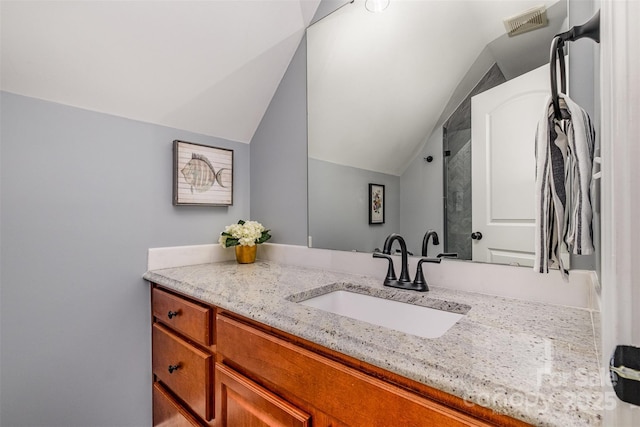 2845 Lakefront Dr, Belmont, NC 28012 - full bath with vaulted ceiling, vanity, and a shower