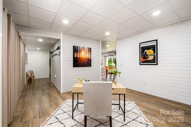 2845 Lakefront Dr, Belmont, NC 28012 - dining space featuring recessed lighting, wood finished floors, wooden walls, and a barn door