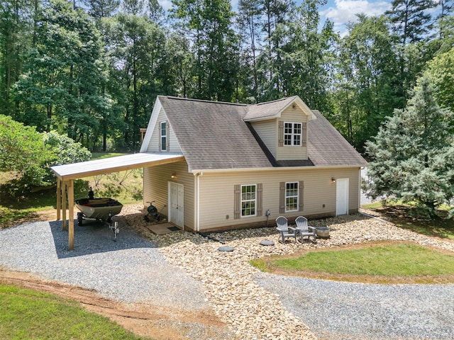 2845 Lakefront Dr, Belmont, NC 28012 - view of front of home featuring driveway, roof with shingles, and view of wooded area