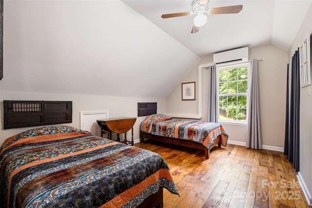 2845 Lakefront Dr, Belmont, NC 28012 - bedroom with a wall mounted AC, light wood-type flooring, lofted ceiling, baseboards, and ceiling fan
