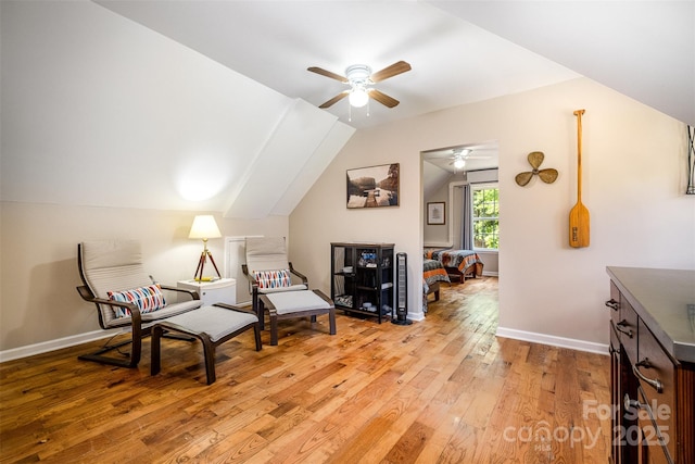 2845 Lakefront Dr, Belmont, NC 28012 - sitting room with a ceiling fan, light wood-style flooring, lofted ceiling, and baseboards
