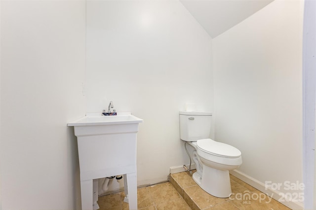 2845 Lakefront Dr, Belmont, NC 28012 - half bath with toilet and vaulted ceiling