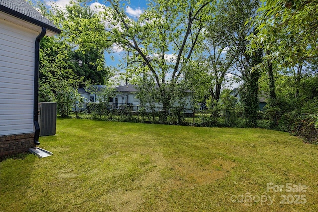 view of yard with central AC