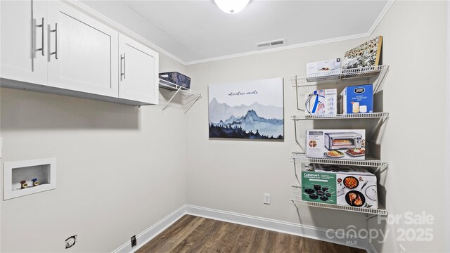 7860 Henry Harris Rd, Fort Mill, SC 29707 - laundry room with cabinet space, hookup for a washing machine, ornamental molding, dark wood-type flooring, and baseboards