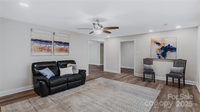7860 Henry Harris Rd, Fort Mill, SC 29707 - living area with wood finished floors, ceiling fan, recessed lighting, and baseboards