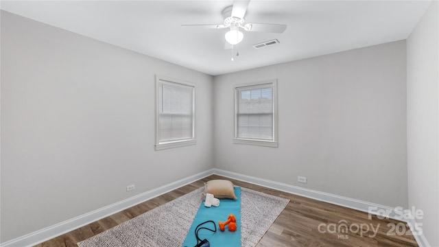 7860 Henry Harris Rd, Fort Mill, SC 29707 - spare room featuring wood finished floors, ceiling fan, and baseboards