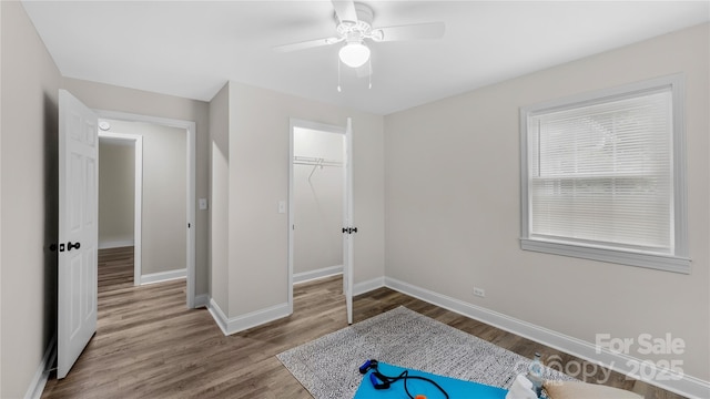 7860 Henry Harris Rd, Fort Mill, SC 29707 - unfurnished bedroom featuring baseboards, wood finished floors, a closet, and ceiling fan