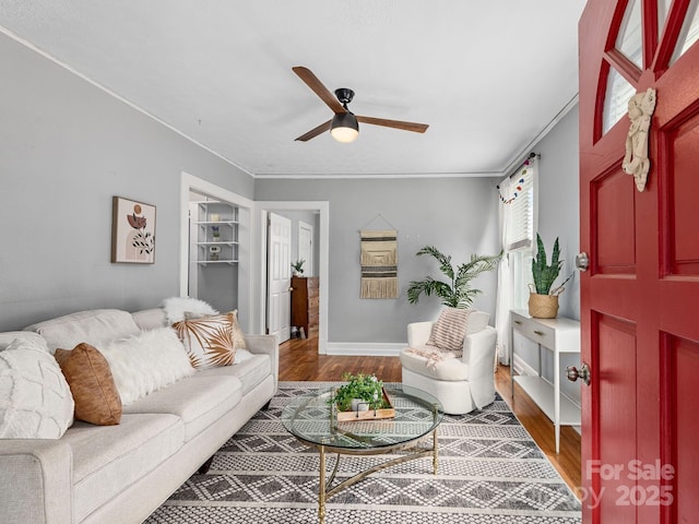 5 Enka Oak St, Candler, NC 28715 - living room with a ceiling fan, wood finished floors, and crown molding