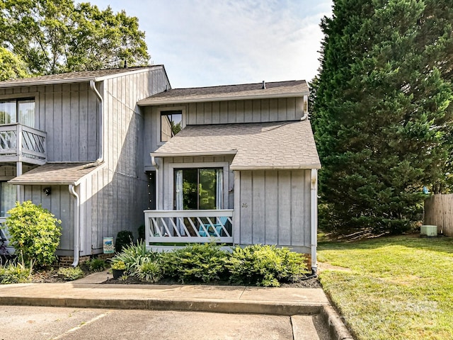 100 Willow Run Dr Unit 26, Gastonia, NC 28056 - view of front facade with a front lawn and roof with shingles