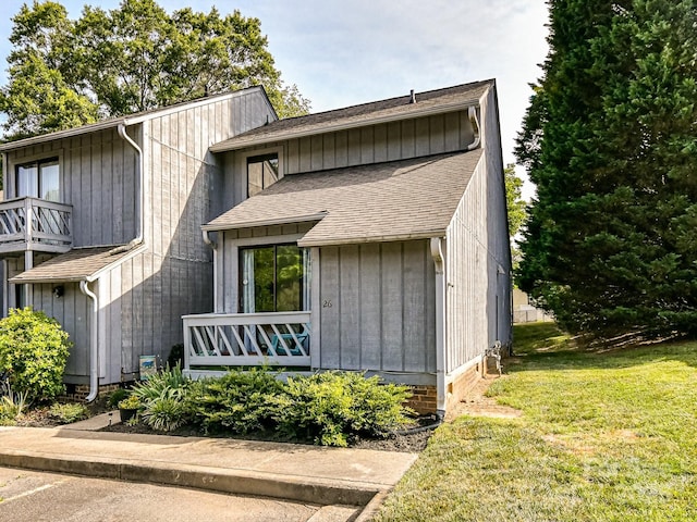 100 Willow Run Dr Unit 26, Gastonia, NC 28056 - view of front of home with a front lawn and a shingled roof