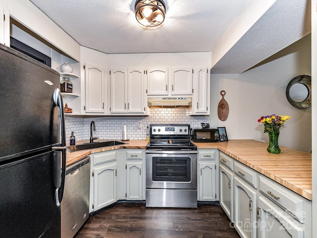 100 Willow Run Dr Unit 26, Gastonia, NC 28056 - kitchen featuring stainless steel appliances, a sink, under cabinet range hood, dark wood finished floors, and a textured ceiling