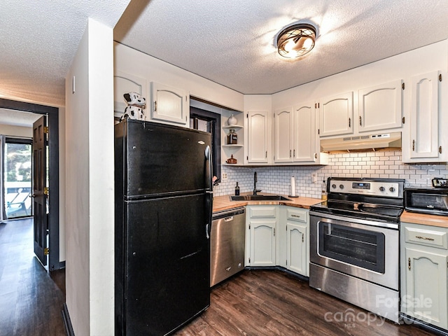 100 Willow Run Dr Unit 26, Gastonia, NC 28056 - kitchen with appliances with stainless steel finishes, wooden counters, a sink, under cabinet range hood, and a textured ceiling