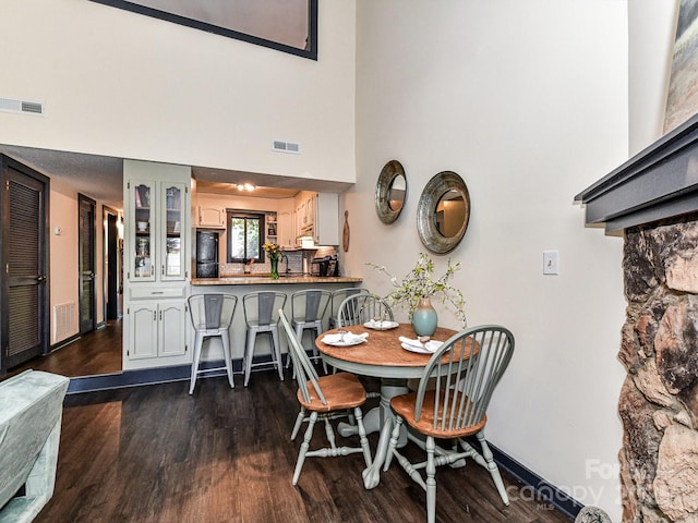 100 Willow Run Dr Unit 26, Gastonia, NC 28056 - dining space with dark wood-style floors and a towering ceiling