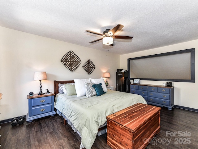 100 Willow Run Dr Unit 26, Gastonia, NC 28056 - bedroom with baseboards, dark wood-type flooring, ceiling fan, and a textured ceiling