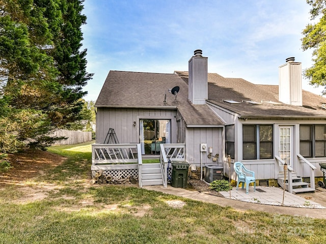 100 Willow Run Dr Unit 26, Gastonia, NC 28056 - back of house with a chimney, entry steps, a wooden deck, a patio, and roof with shingles