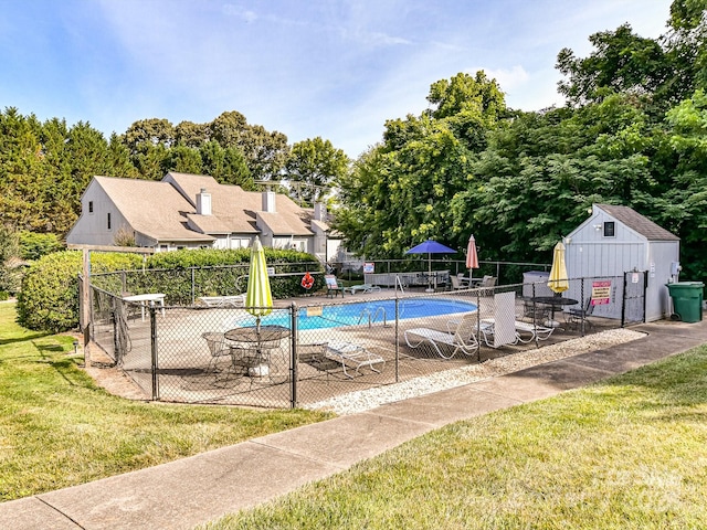 100 Willow Run Dr Unit 26, Gastonia, NC 28056 - community pool featuring a patio area, a storage unit, and an outbuilding