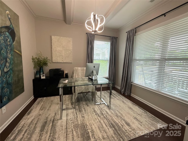 office space featuring a chandelier, ornamental molding, baseboards, and wood finished floors