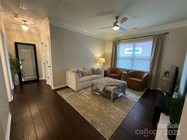 living area featuring ornamental molding, a ceiling fan, baseboards, and dark wood-style flooring