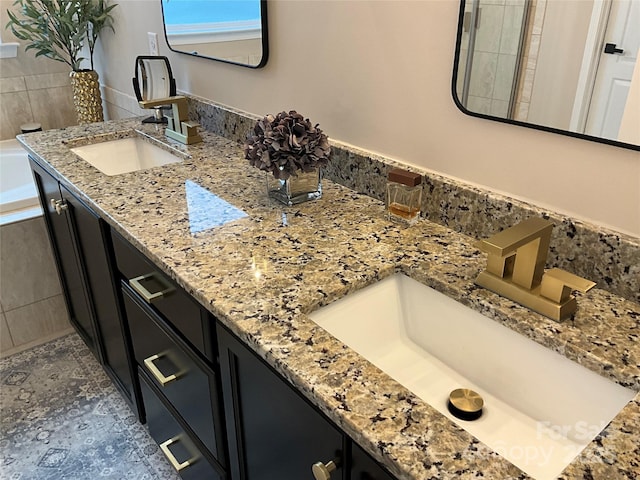 full bathroom featuring double vanity