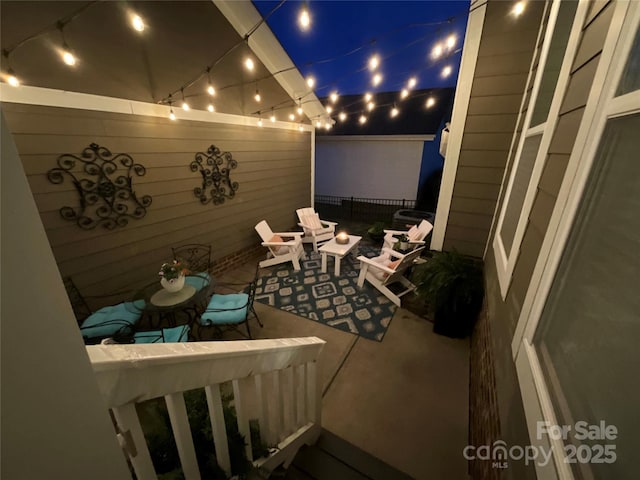 patio at night with fence