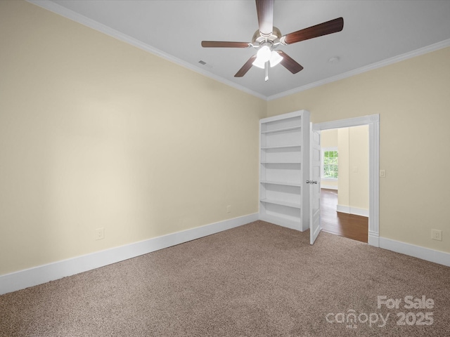 300 W 12th St, Salisbury, NC 28144 - empty room with carpet flooring, a ceiling fan, baseboards, and ornamental molding