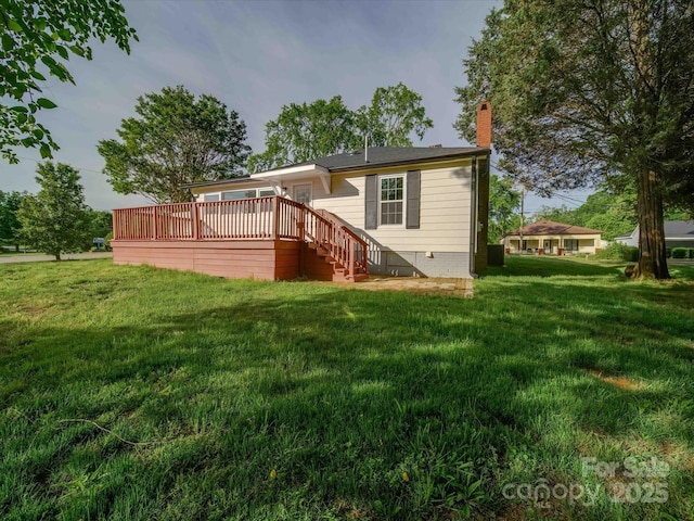 300 W 12th St, Salisbury, NC 28144 - back of house with a deck, a lawn, a chimney, stairs, and crawl space