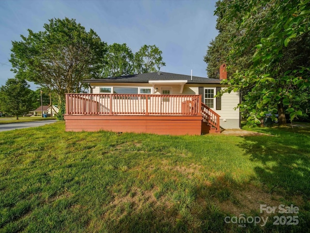 300 W 12th St, Salisbury, NC 28144 - back of property with a chimney, a yard, and a deck