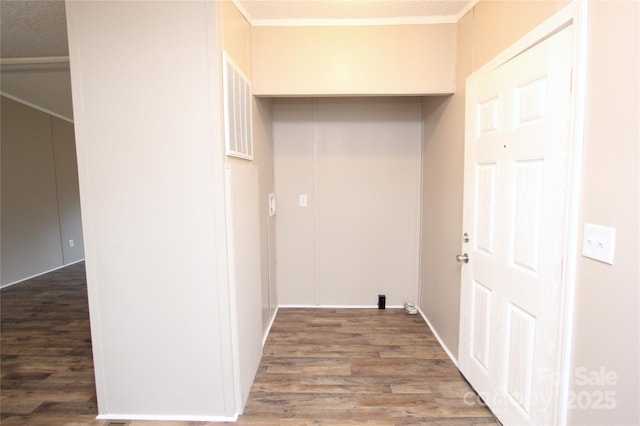 corridor featuring wood finished floors