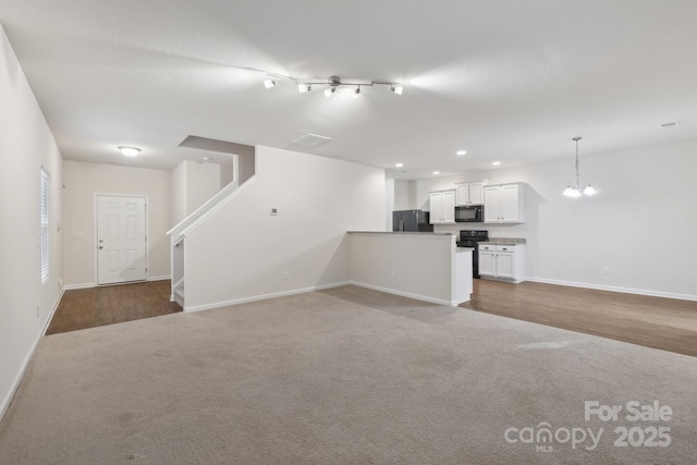 1835 Allegheny Dr, Gastonia, NC 28054 - unfurnished living room with carpet, baseboards, stairs, and recessed lighting