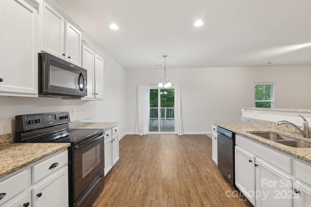 1835 Allegheny Dr, Gastonia, NC 28054 - kitchen with black appliances, baseboards, a sink, light wood finished floors, and recessed lighting