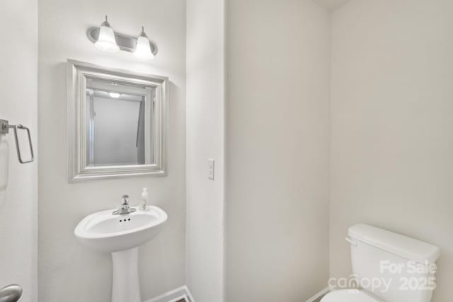 1835 Allegheny Dr, Gastonia, NC 28054 - bathroom featuring toilet and baseboards