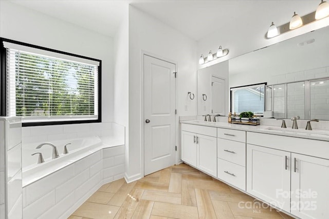 862 Kathy Dianne Dr, Fort Mill, SC 29707 - bathroom featuring double vanity, a garden tub, and a shower stall