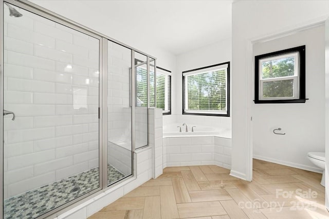 862 Kathy Dianne Dr, Fort Mill, SC 29707 - full bathroom featuring a garden tub, a shower stall, toilet, and baseboards