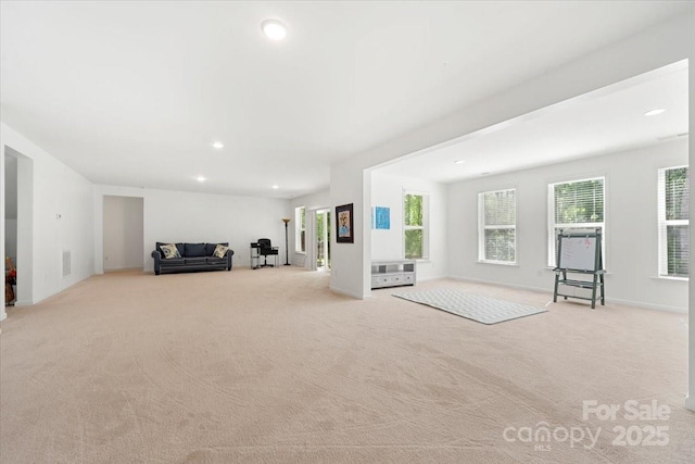 862 Kathy Dianne Dr, Fort Mill, SC 29707 - unfurnished living room featuring carpet flooring, healthy amount of natural light, and recessed lighting