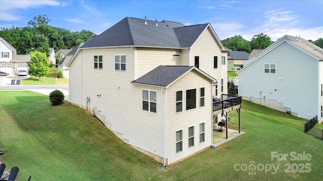 862 Kathy Dianne Dr, Fort Mill, SC 29707 - back of property with roof with shingles, a yard, and a wooden deck