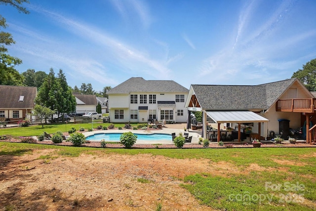 2763 Rivendale Ct, Indian Land, SC 29707 - rear view of house with an outdoor pool, a gazebo, a patio area, and roof with shingles