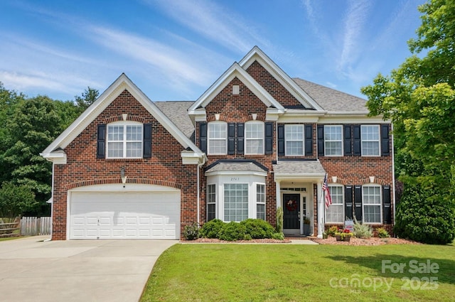 2763 Rivendale Ct, Indian Land, SC 29707 - view of front of house with concrete driveway, a garage, brick siding, and a shingled roof