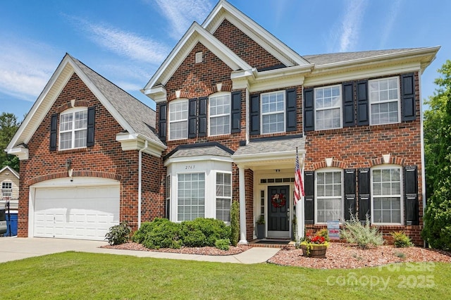 2763 Rivendale Ct, Indian Land, SC 29707 - view of front of property featuring brick siding, a garage, driveway, a front yard, and a shingled roof