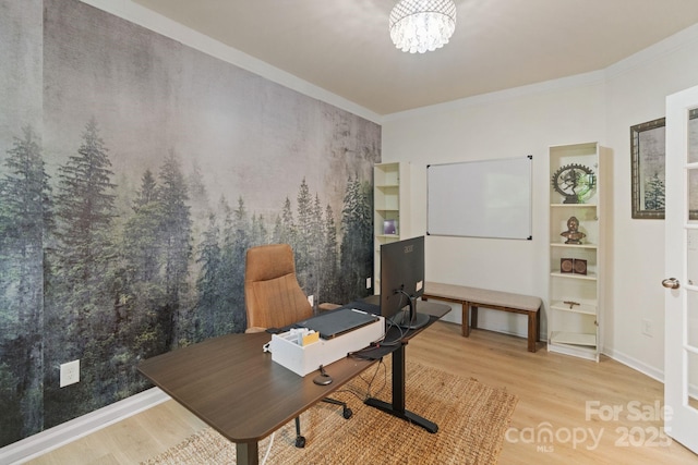 1104 Snowbird Ln, Waxhaw, NC 28173 - office area featuring wood finished floors, ornamental molding, and a chandelier