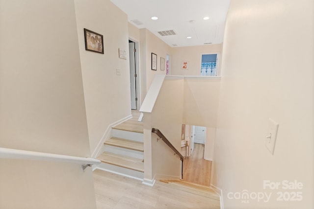 1104 Snowbird Ln, Waxhaw, NC 28173 - staircase featuring wood finished floors, recessed lighting, and attic access