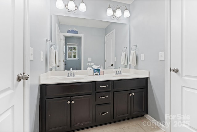 1104 Snowbird Ln, Waxhaw, NC 28173 - bathroom with double vanity, tile patterned floors, and baseboards
