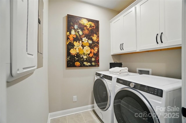 12055 Lavinia Ln, Charlotte, NC 28277 - washroom featuring cabinet space, washing machine and clothes dryer, baseboards, and light tile patterned floors