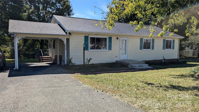824 S Laurel St, Lincolnton, NC 28092 - ranch-style home with a front lawn, driveway, a shingled roof, and a carport