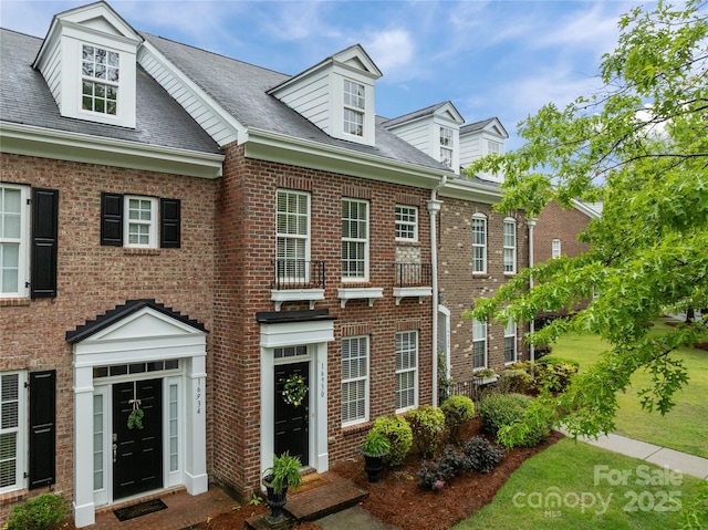 16930 Summers Walk Blvd, Davidson, NC 28036 - georgian-style home with brick siding and roof with shingles