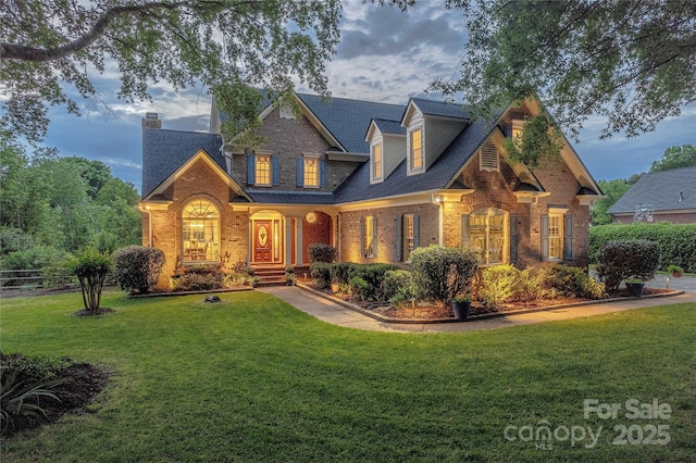 6024 Highview Rd, Weddington, NC 28104 - view of front of home featuring brick siding, roof with shingles, and a chimney