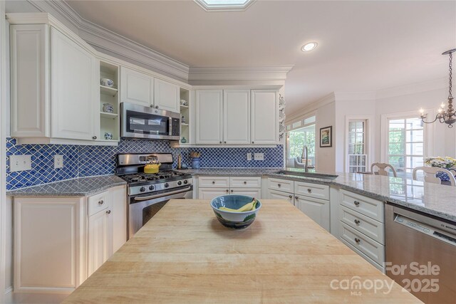 6024 Highview Rd, Weddington, NC 28104 - kitchen with appliances with stainless steel finishes, a sink, open shelves, butcher block countertops, and white cabinets